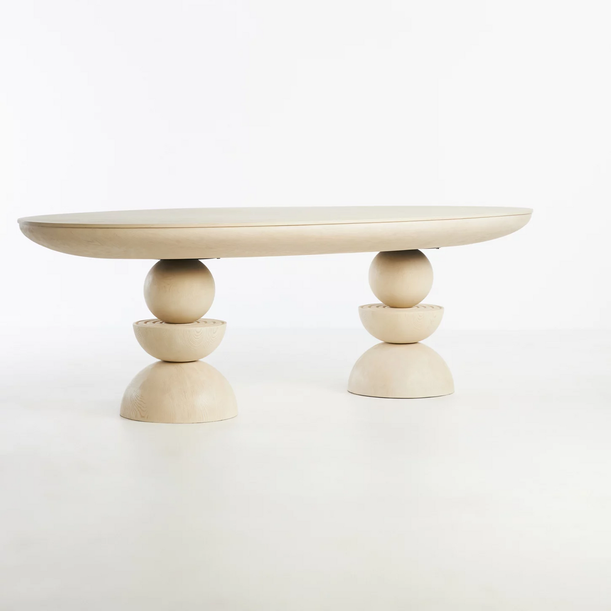 Sculptural Round Pedestal Dining Table