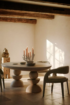 Sculptural Round Pedestal Dining Table